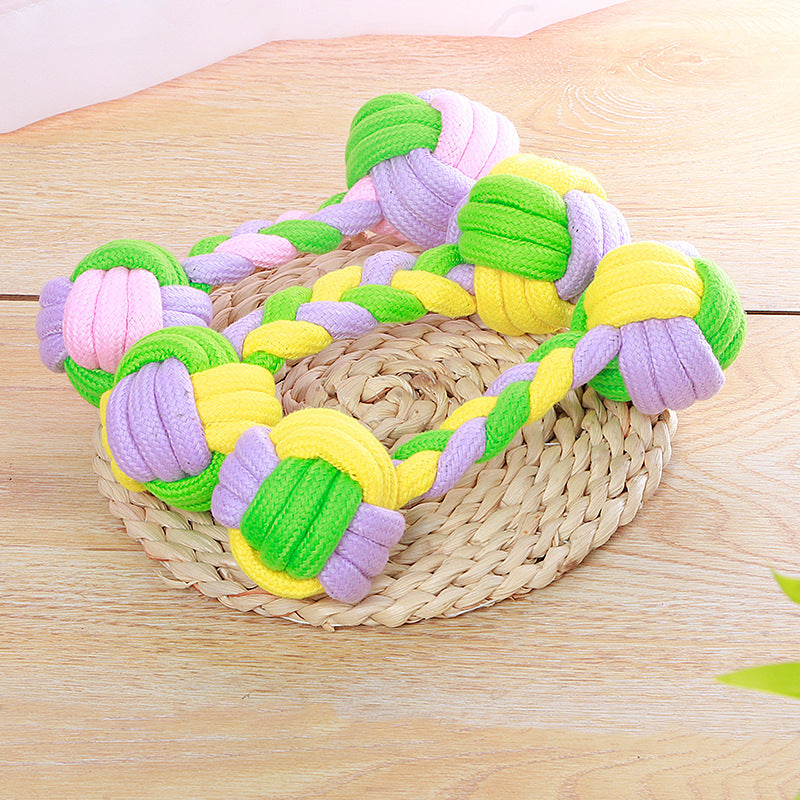 Candy color cotton rope dumbbell pet toy for dogs, featuring durable cotton material and vibrant colors for play and chewing.