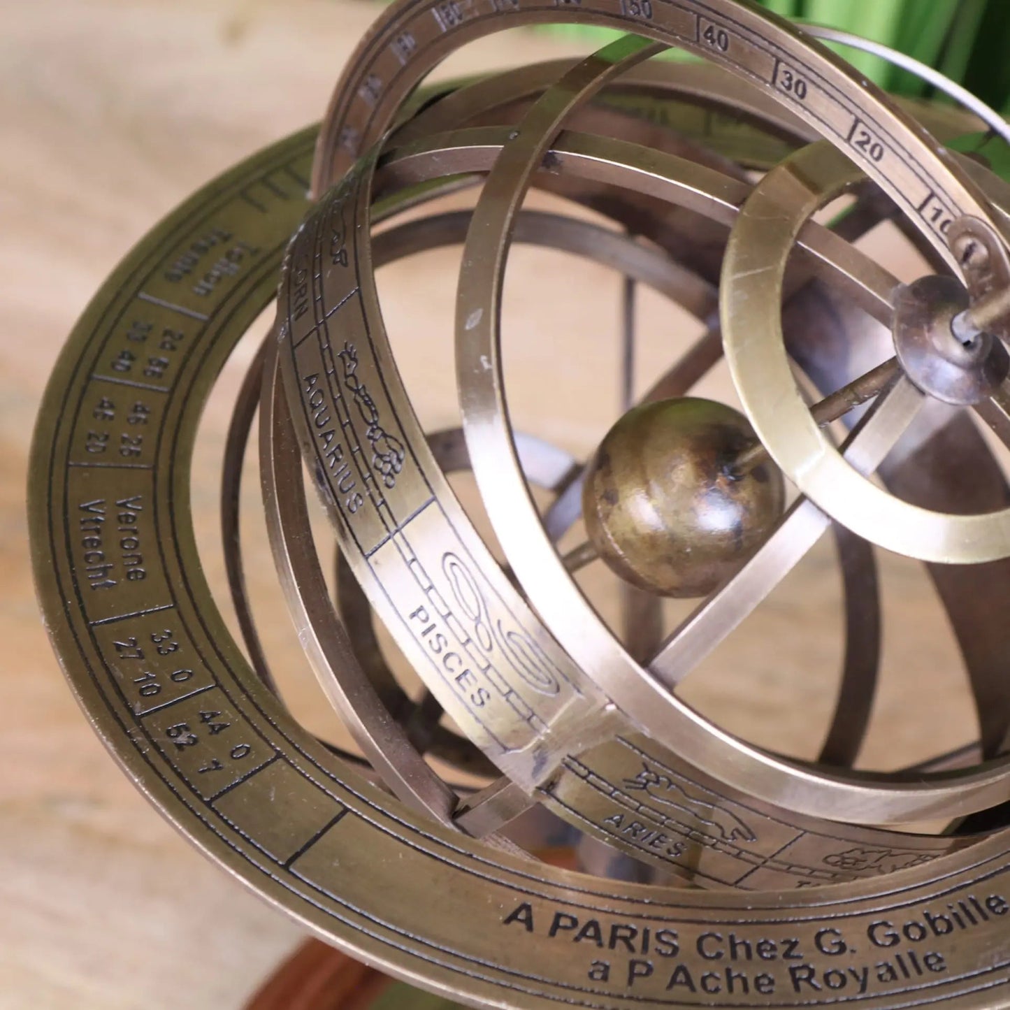 Maravi Ponnur large brass armillary sphere ornament, 30cm desk accessory with intricate metal design.