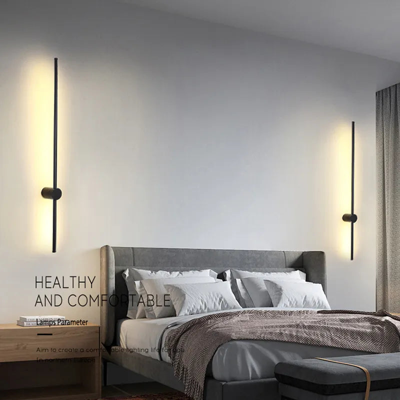 Black LED wall light by Light My House, modern warm-toned bedroom lounge lamp, easy to install wall-mounted lighting fixture.