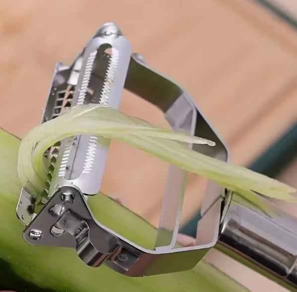 Multi-functional DEPOT peeler with ergonomic handle and sharp blade, suitable for peeling vegetables and fruits efficiently.