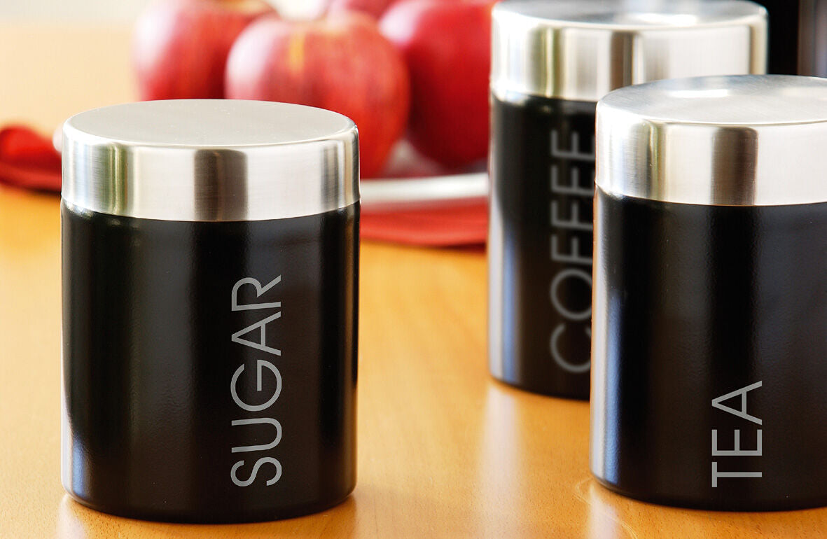 Orsina Liberty Black enamel sugar canister with silver lid, featuring a sleek black finish and shiny silver top.
