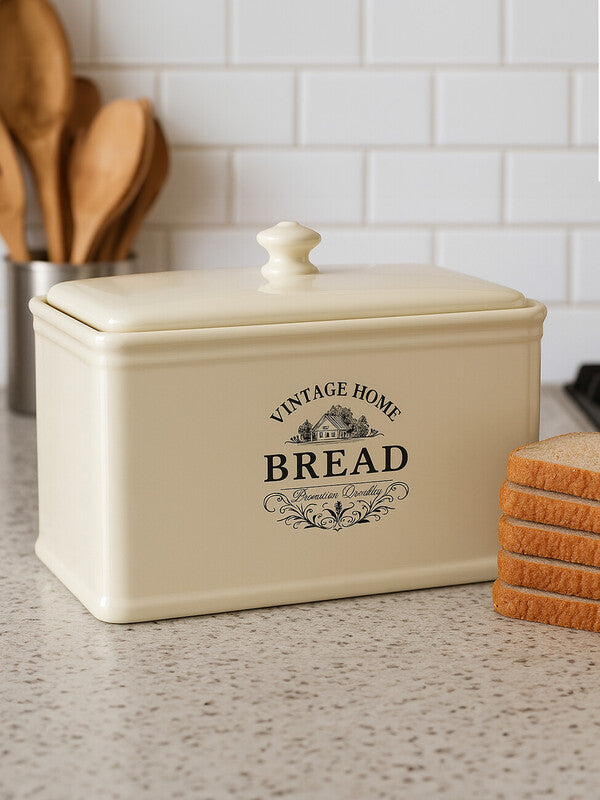 Vintage Orsina ceramic bread bin with cream finish, featuring a classic design for stylish kitchen storage.