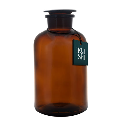 Amber glass apothecary jar for bathroom decor, 1-litre size, by Kuishi, with a clear lid and vintage apothecary style.