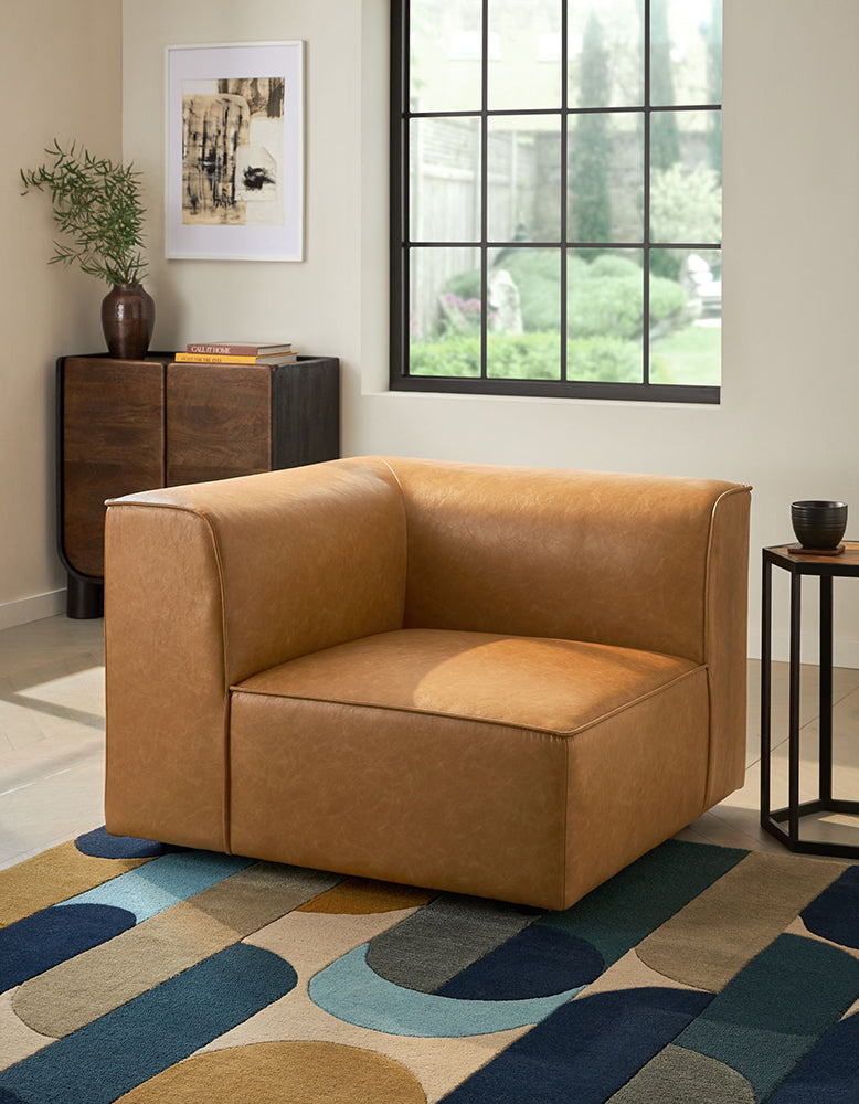 DC Concept Van Dyke Modular Sofa three-seater corner sofa with plush cushions and modern design in a stylish living room setting.