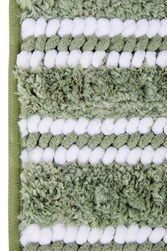 Sage green large bath mat by Orsina with textured fabric, designed for bathroom use and comfort.