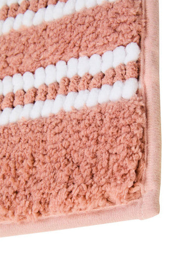 Dusky pink large bath mat from Orsina with soft, plush texture suitable for bathroom textiles.