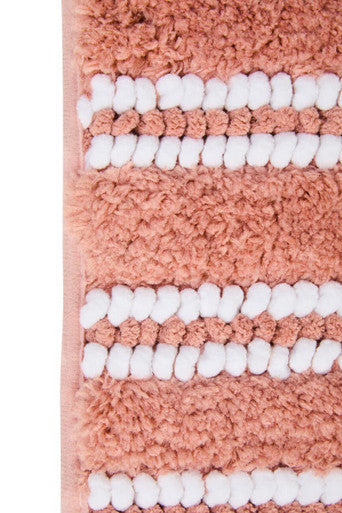 Dusky pink large bath mat from Orsina featuring soft, absorbent bathroom textile for comfort and style.