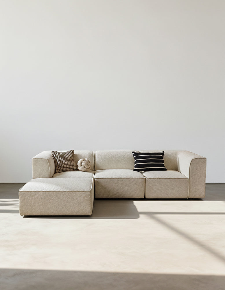 Three-seater Van Dyke Modular Sofa by DC Concept, showing the modern corner sofa with plush cushions in a stylish living room setting.