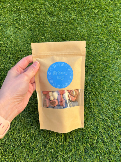 Happy Barkday Treat Pick n Mix chocolate treats for dogs by The Bonnie Hound, 150g, with assorted colorful chocolate-shaped dog treats.