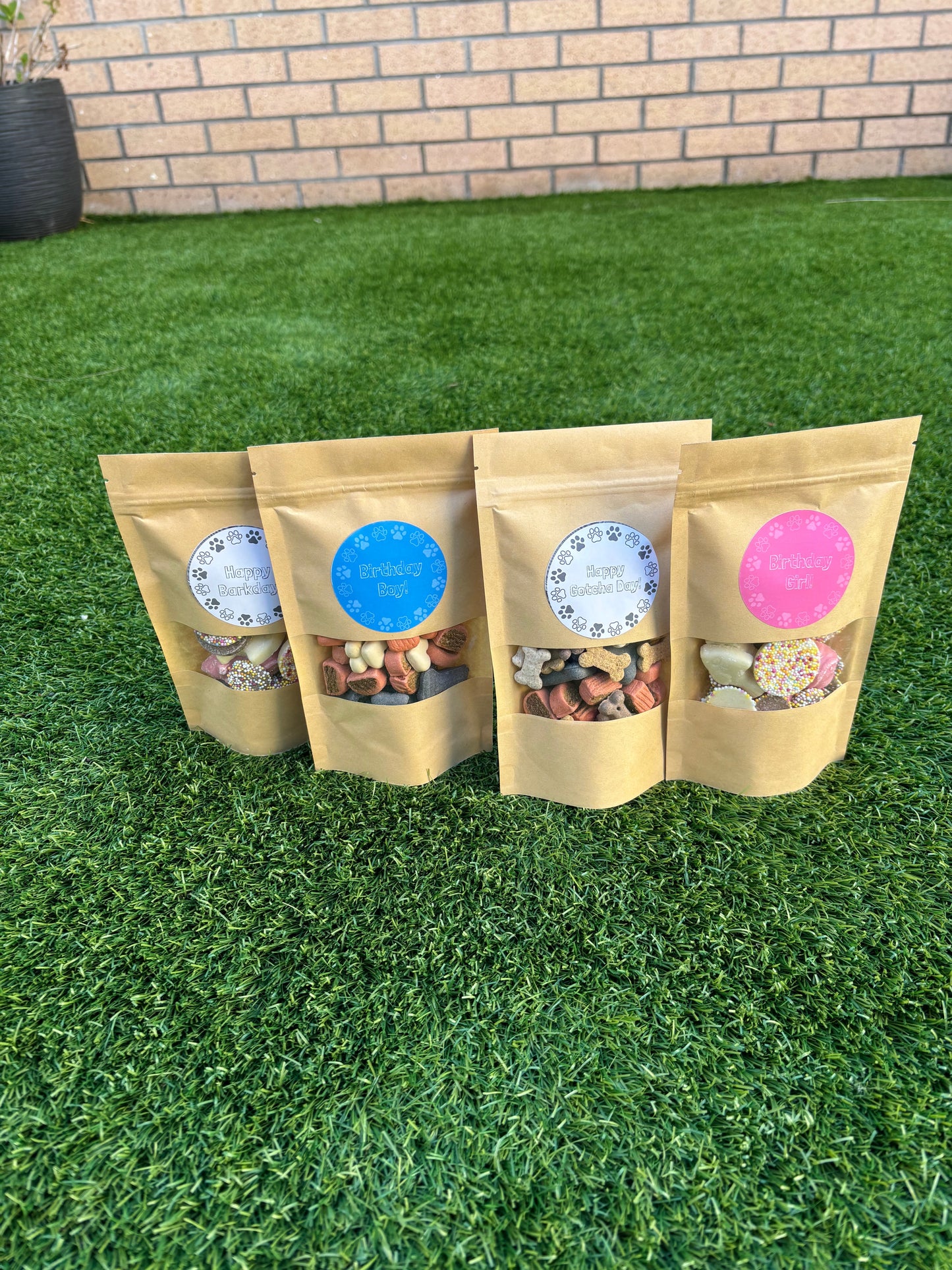 The Bonnie Hound Happy Barkday Treat Pick n Mix chocolate treats for dogs, 150g, assorted chocolate-flavored dog treats in a colorful package.