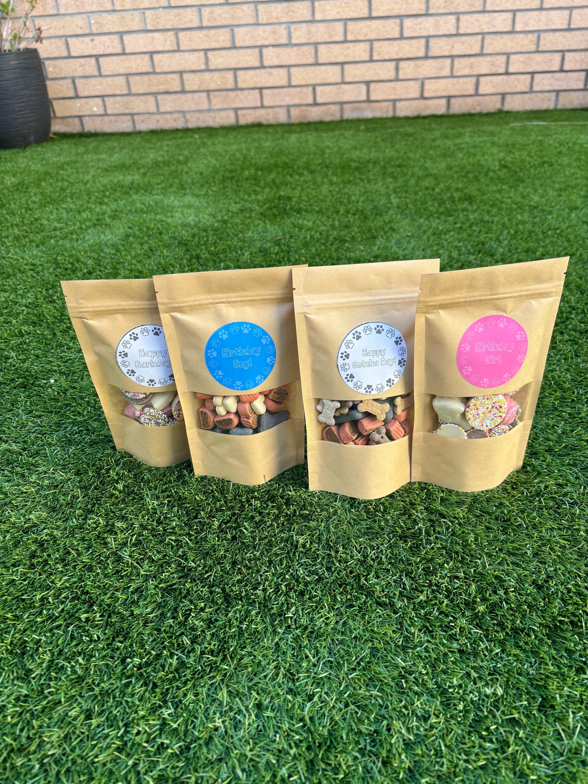 The Bonnie Hound Happy Barkday Treat Pick n Mix chocolate treats for dogs, 150g, assorted chocolate-flavored dog treats in a colorful package.
