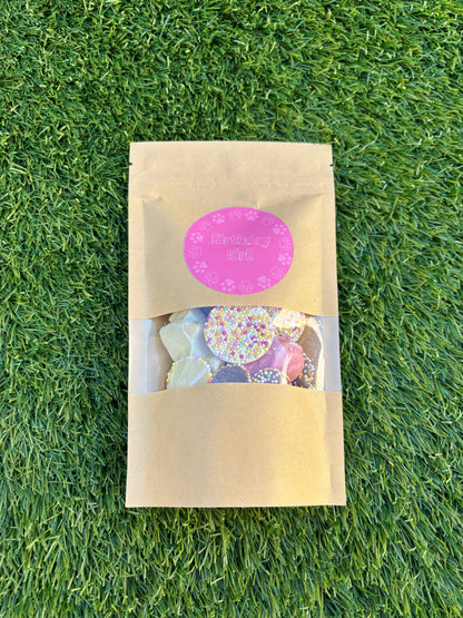 The Bonnie Hound Happy Barkday Treat Pick n Mix chocolate treats in a 150g bag, featuring assorted dog-friendly chocolates and colorful packaging.