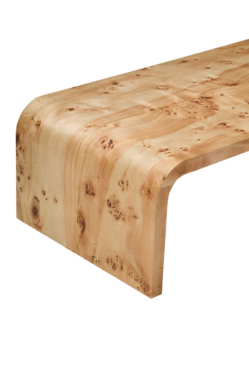 Natural Burl wood coffee table with smooth curved edges by Orsina, showcasing a polished, elegant design in a modern living space.