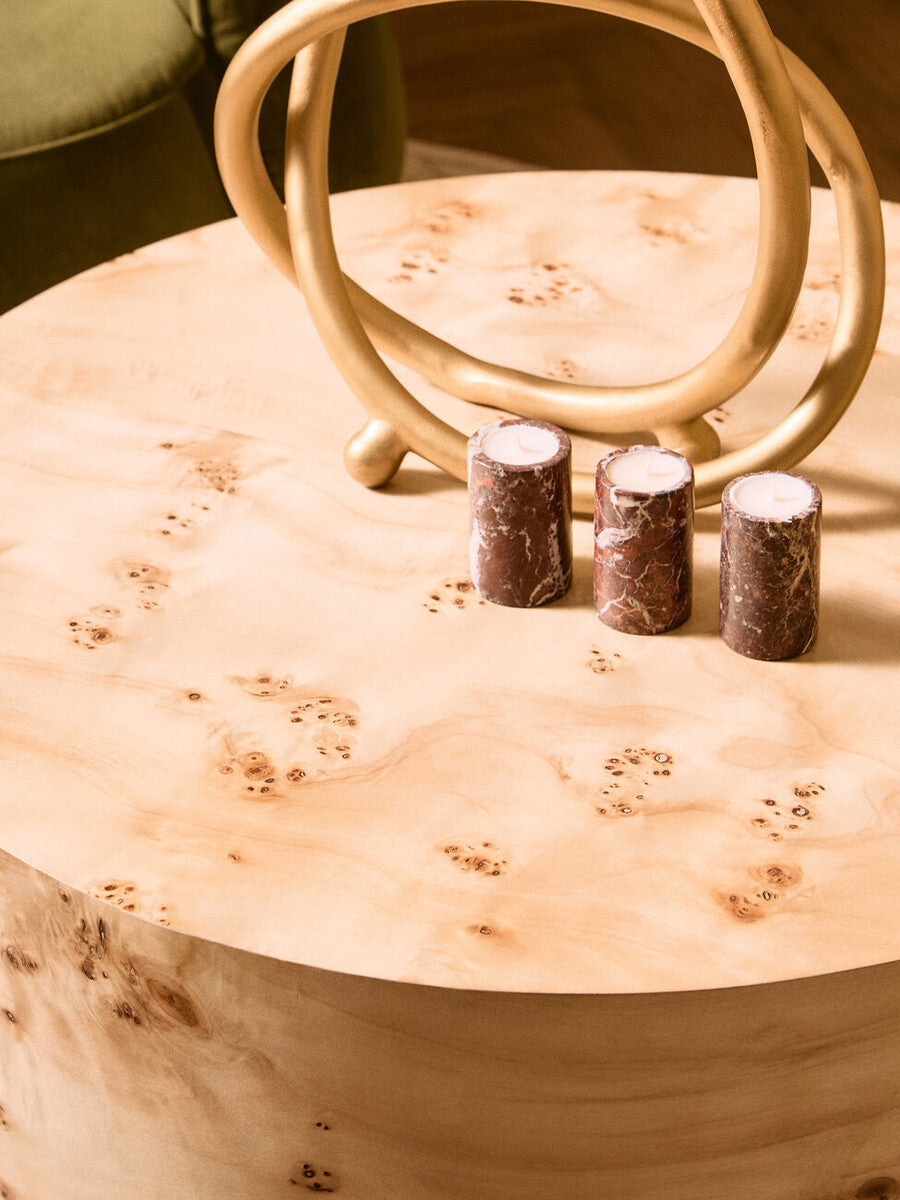 Natural Burl wood round coffee table with drum shape design by Orsina, showcasing smooth wood grain and modern style.