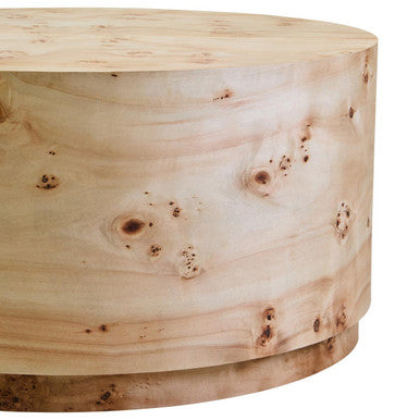 Natural burl wood round coffee table with drum shape design from Orsina, showcasing its smooth finish and elegant wood grain.