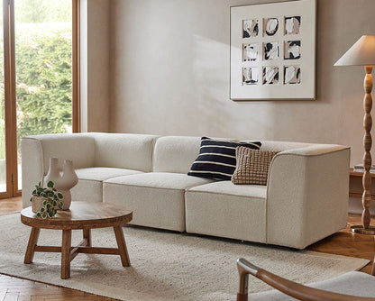DC Concept Van Dyke Modular Sofa, three-seater corner sofa with plush cushions and modern design, shown in a stylish living room setting.