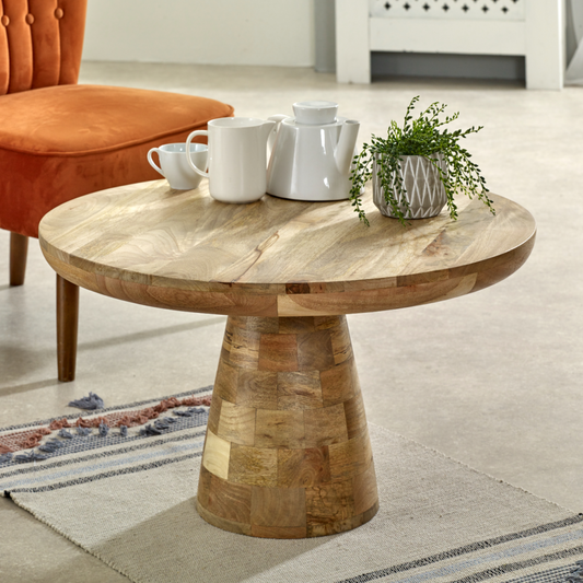 Solid wood Surrey mushroom coffee table by InStock featuring a natural finish and unique mushroom-inspired design in a modern living space.