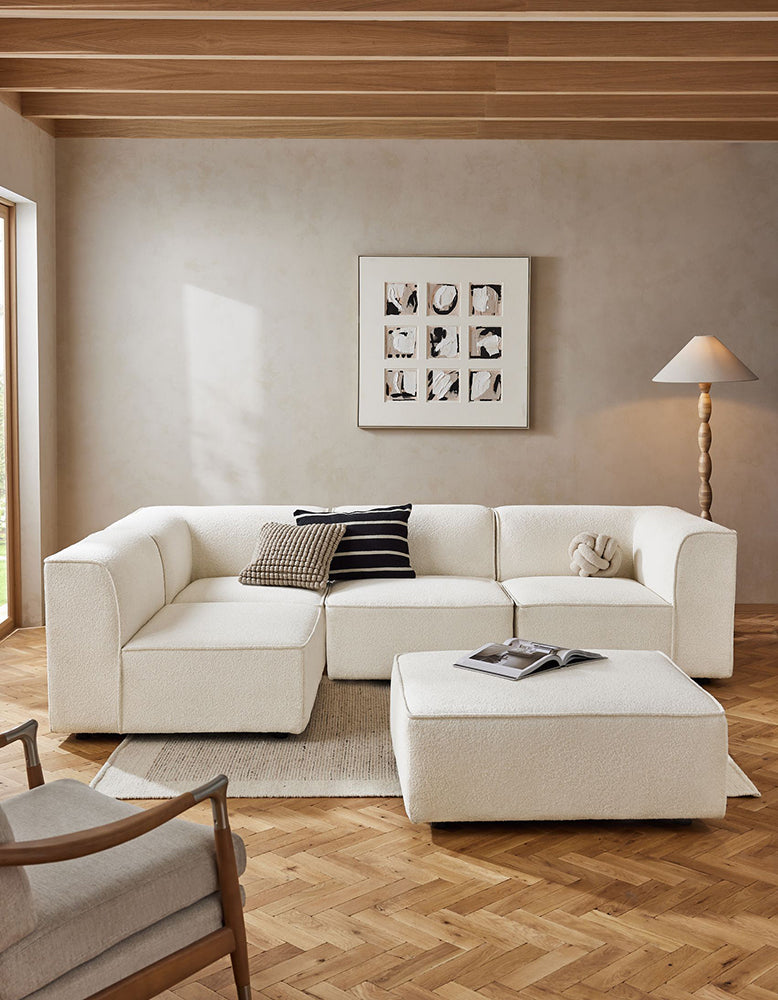 DC Concept Van Dyke Modular Sofa, three-seater corner sofa with plush cushions and modern design in a stylish living room setting.