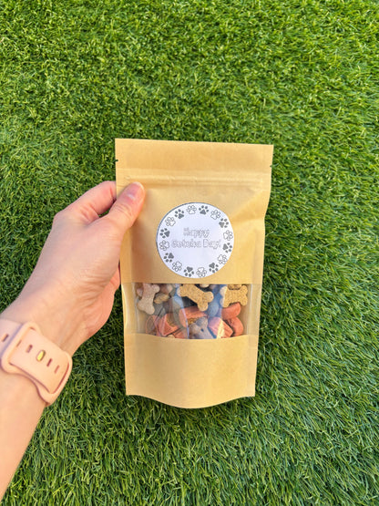 The Bonnie Hound Happy Barkday Treat Pick n Mix chocolate treats for dogs, 150g, assorted chocolate-flavored dog treats in a colorful package.