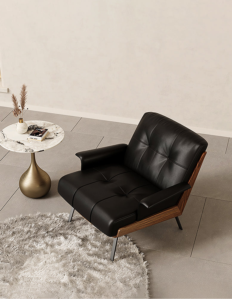 Leather Vasilev armchair by DC Concept, modern lounge chair without armrests, showcasing sleek design and plush cushioning.