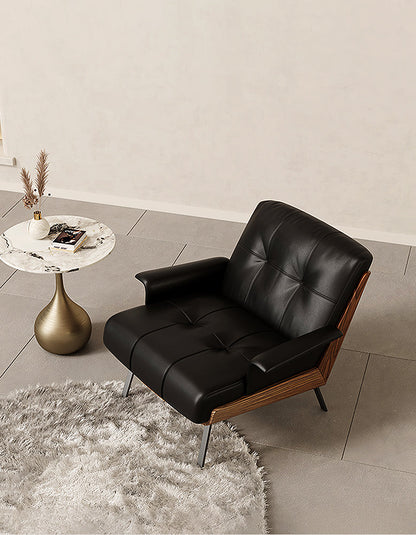 Leather Vasilev armchair by DC Concept, modern lounge chair without armrests, showcasing sleek design and plush cushioning.