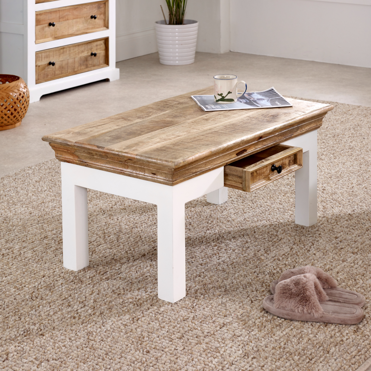 Alfie coffee table with drawer made of solid mango wood, showcasing a modern home and kitchen furniture piece with a sleek finish.