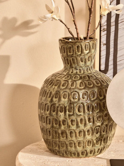 Large green textured ceramic vase by Orsina, featuring a wide opening and decorative surface, perfect for home decor.
