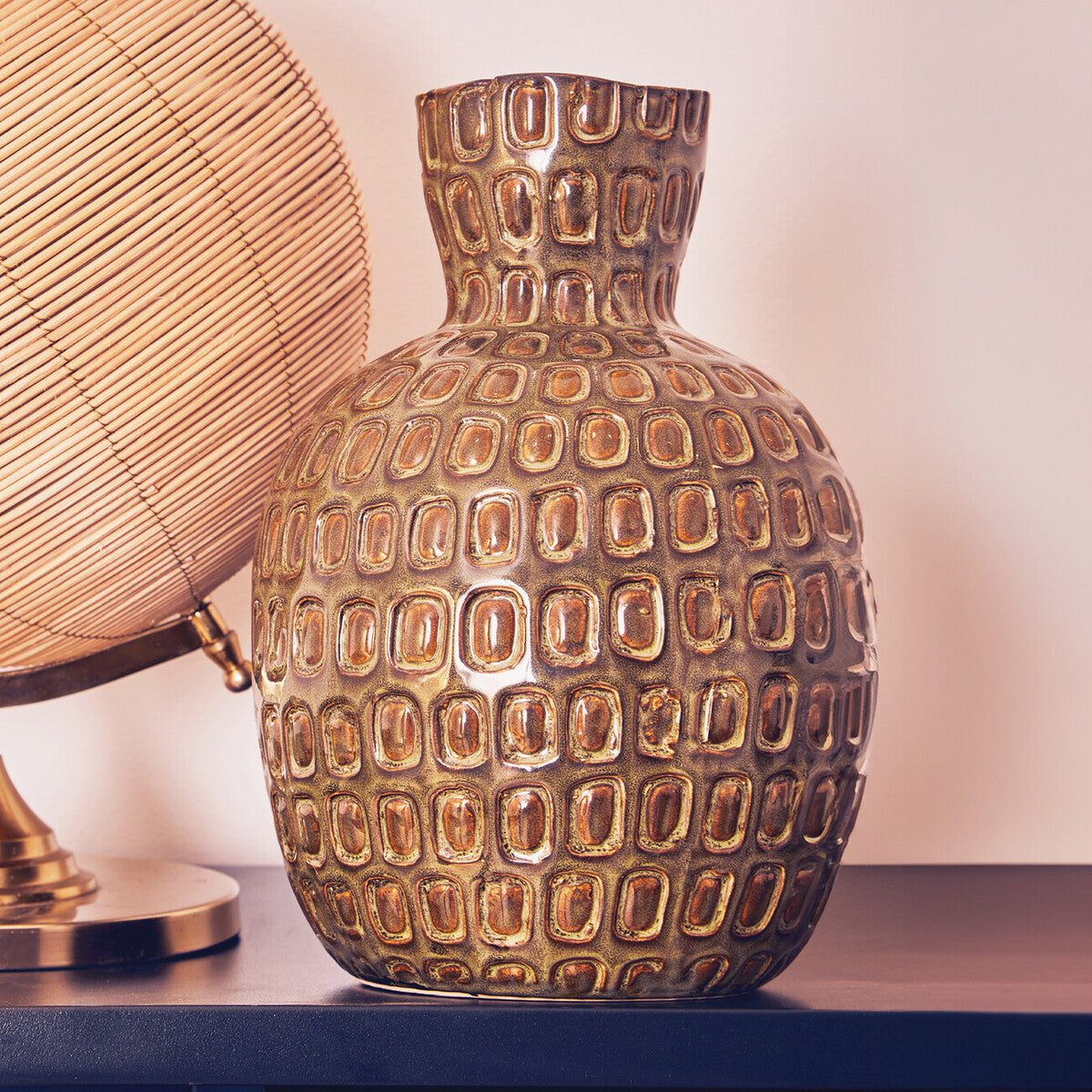 Large green textured ceramic vase by Orsina, featuring a wide opening and decorative surface for stylish home decor.