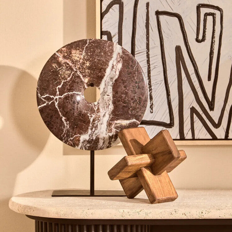 Red marble Salmo medium round 25cm disc sculpture by Orsina, showcasing smooth, polished surface and modern art design.