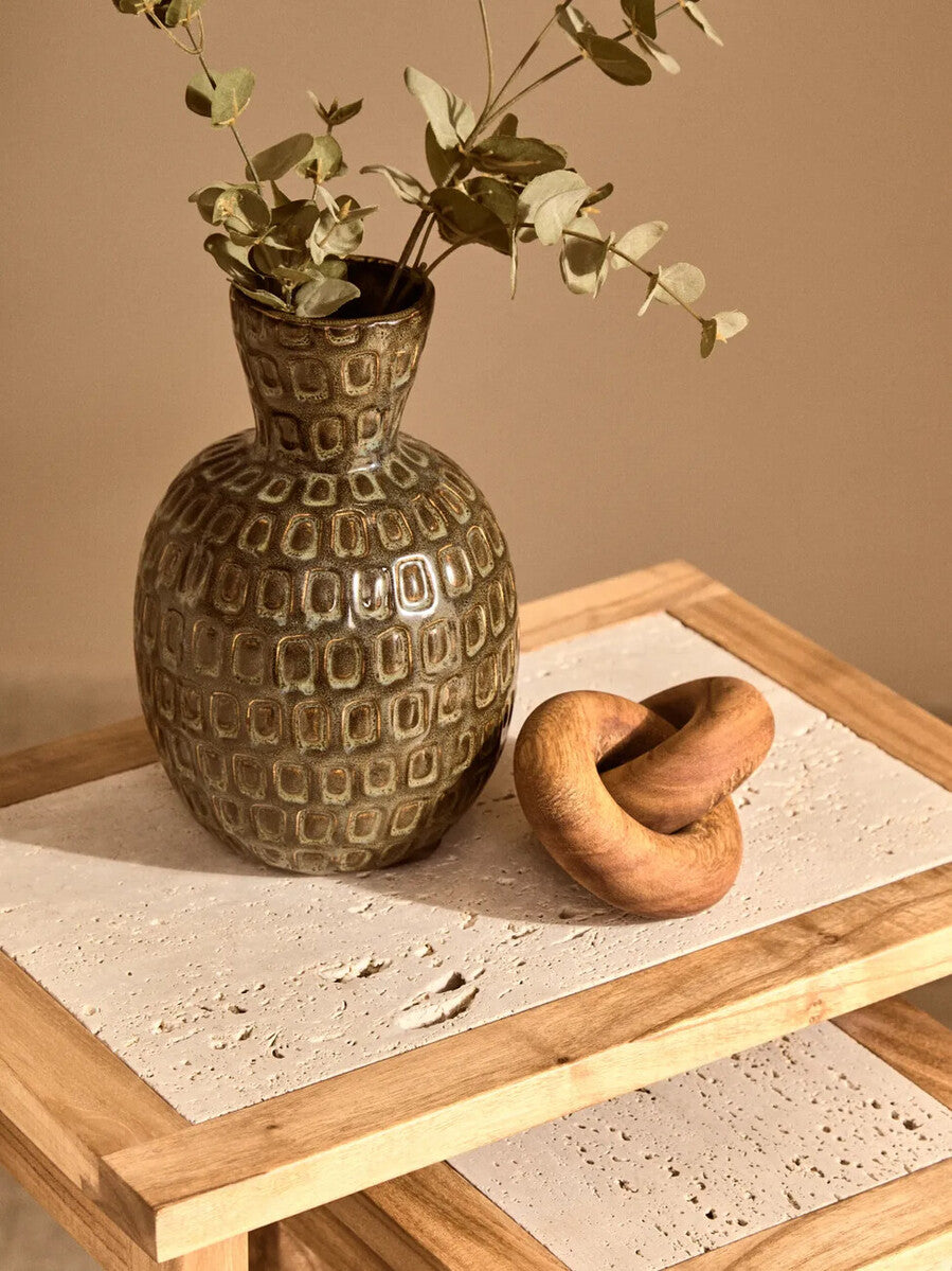Small brown wood knot sculpture by Orsina, decorative knot ornament showcasing natural wood grain and craftsmanship.