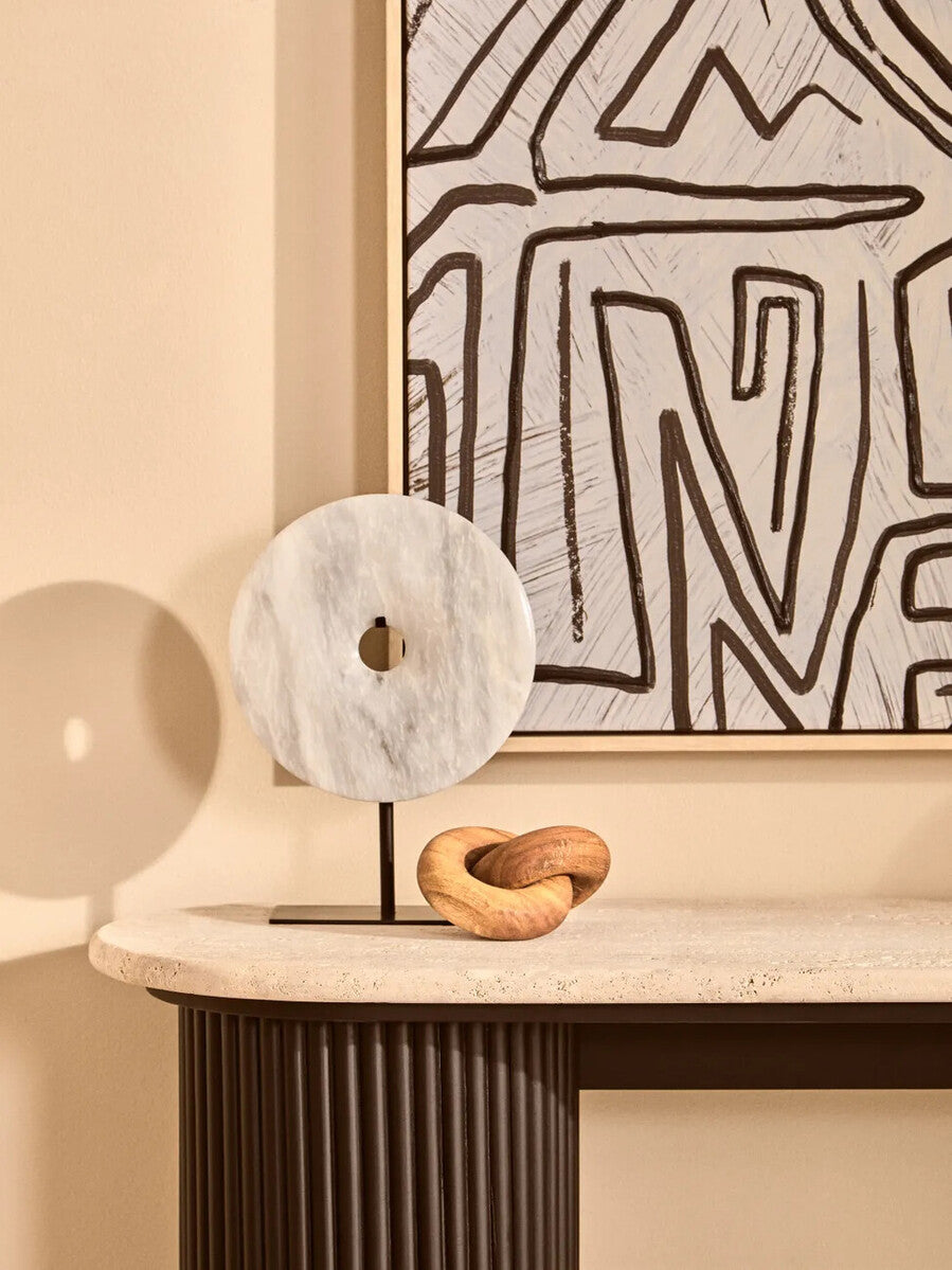Small natural wood knot sculpture by Orsina, showcasing organic texture and craftsmanship, ideal as a decorative ornament.