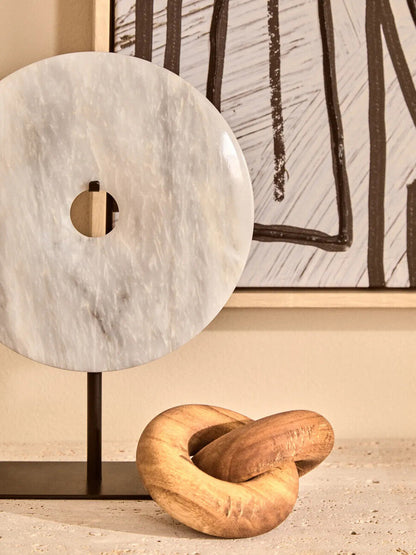 Orsina Cato Natural Wood Small Knot Decor sculpture with smooth, polished knot design on a neutral background.