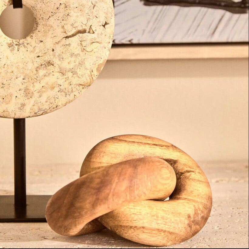 Small natural wood knot sculpture from Orsina, featuring intricate wood grain and organic knot details for decorative use.