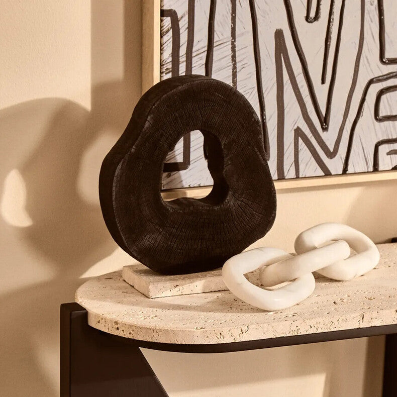 Orsina Tibor black mango wood sculpture with travertine base, modern decorative art piece for home or office display.