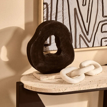 Orsina Tibor black mango wood sculpture with travertine base, modern decorative art piece for home or office display.