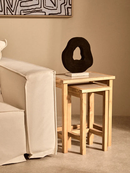 Orsina Tibor black mango wood sculpture with travertine base, modern decorative art piece, detailed wood grain and smooth stone finish.