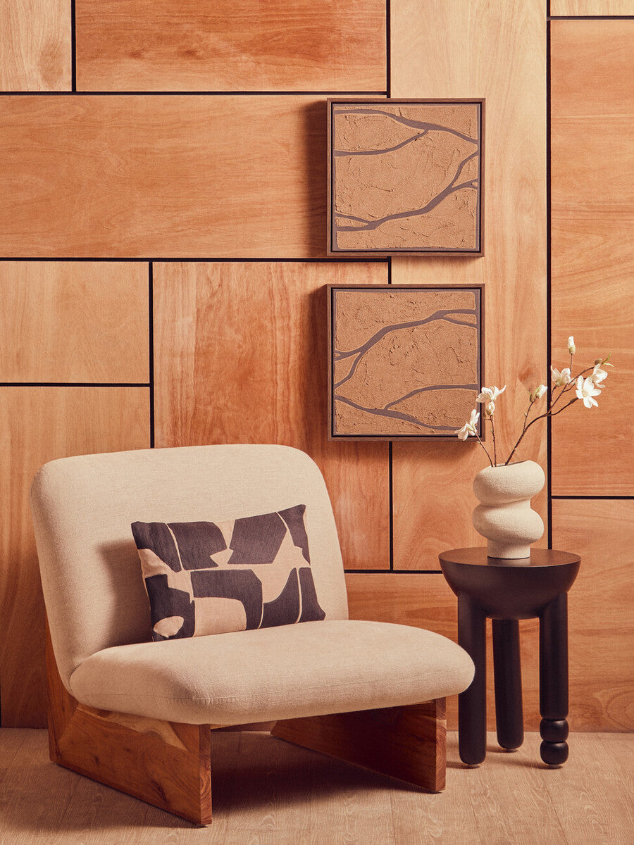 Two textured brown and black wall art pieces from Orsina's Astratto set, showcasing abstract, modern wall decor images.