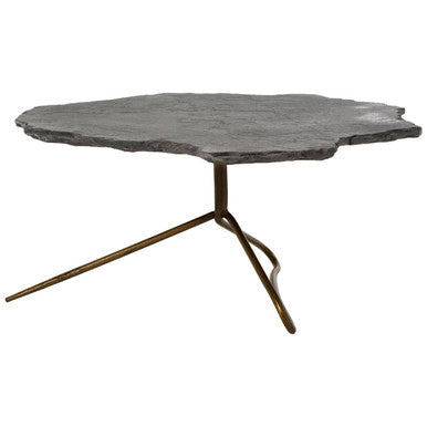 Grey stone top coffee table with tripod geometric base by Orsina, showcasing a modern, minimalist design.