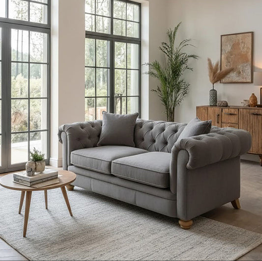 Orsina Spencer two-seater grey fabric sofa with plush cushions and modern design, perfect for a cozy living room setting.