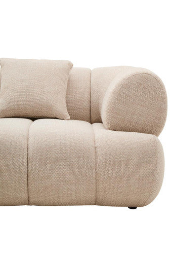 Cream linen 3-seater curved sofa by Orsina with plush cushions and modern design, perfect for contemporary living rooms.
