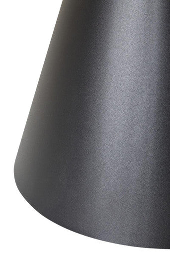 Clear glass round top coffee table with black conical metal base by Orsina, perfect for modern living rooms.