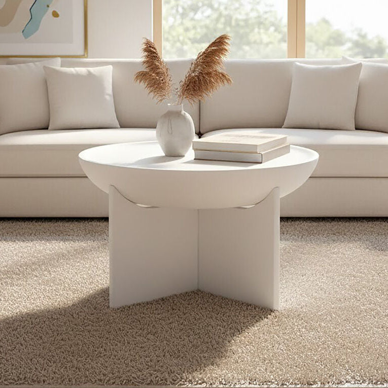 Whitewash mango wood round coffee table with cut-out pedestal base by Orsina, showcasing smooth finish and modern design.
