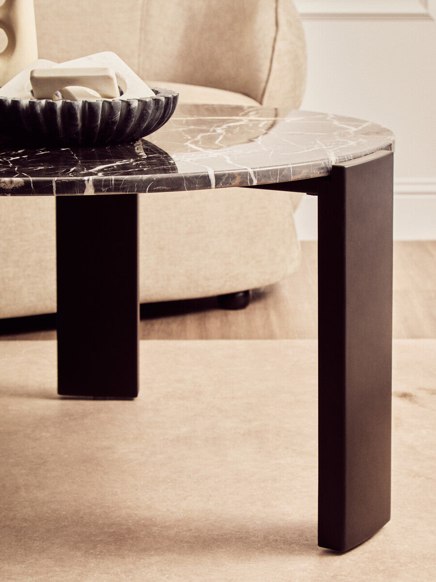 Black round marble top coffee table with black acacia wood legs, Palermo by Orsina, modern living room furniture.