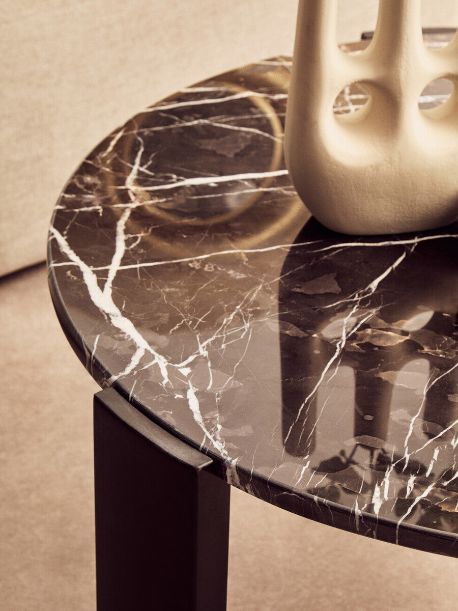 Black round marble top coffee table with black acacia wood legs, Palermo style by Orsina, modern living room furniture.