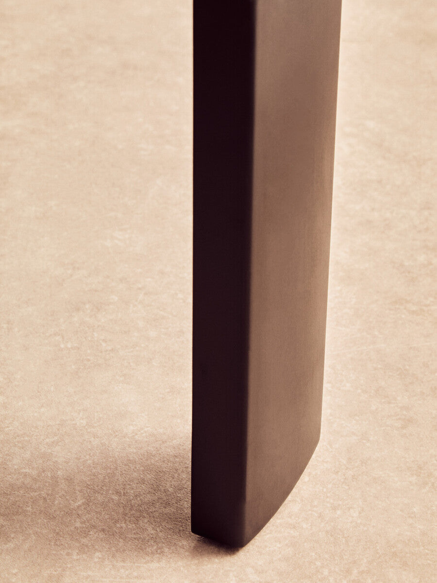 Black round marble coffee table with black acacia wood legs, Palermo by Orsina, showcasing a sleek modern design.