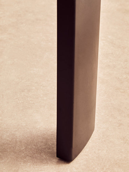 Black round marble coffee table with black acacia wood legs, Palermo by Orsina, showcasing a sleek modern design.