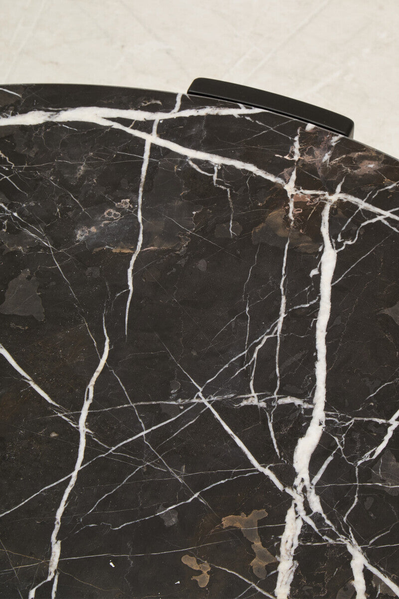 Black round marble top coffee table with black acacia wood legs, large size, by Orsina Palermo.