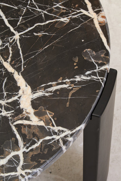 Black round marble top coffee table with black acacia wood legs from Orsina's Palermo collection.