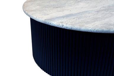 Cream polished travertine top coffee table with ridged black acacia wood drum base by Orsina, modern and stylish living room furniture.