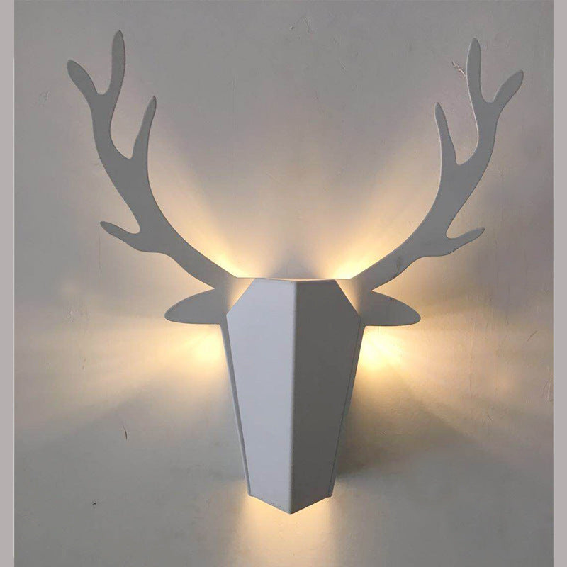 Decorative living room wall lamp by Michan Direct featuring a modern design with warm lighting and sleek metal finish.
